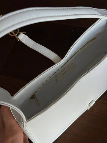 Женская сумка-хобо Saint Laurent / Сен Лоран Le 5 A 7, кожаная, среднего размера, белая, Китай pr00391 - S03053-591545 фото