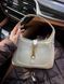 Жіноча сумка-хобо Gucci / Гуччі, з натуральної шкіри, округлий силует і плечовий ремінець, біла, Китай #art0267-273203 фото